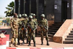 epa05036173 Malian soldiers stand guard outside the Radisson Hotel following a hostage situation a day earlier, in Bamako, Mali 21 November 2015. A state of emergency has been imposed for ten days in Mali following the hostage suitation at the Radisson Hotel in the capital Bamako. At least 27 people were dead on 20 November after Malian special forces stormed the hotel that had been seized by suspected Islamist militants. EPA/STR