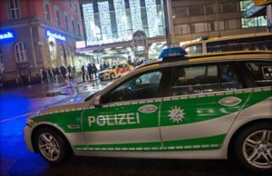 epa05084858 German police on duty at the main railway station in central Munich, Germany, 31 December 2015. Police evacuated Munich's main train station and a second station in the city's Pasing district in response to a credible terrorist threat to the Bavarian capital, authorities said. No trains are approaching the main station, Germany's second busiest, and the outlying station, police said on Twitter. 'In response to credible reports, Munich police believe that there is a threat of a terrorist attack in the Munich area. According to available information, which we have judged to be credible, an attack is intended to be carried out on the evening of 31 December 2015,' police say on Facebook. EPA/SVEN HOPPE