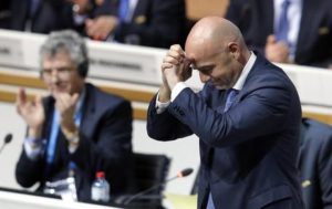New elected FIFA president Gianni Infantino, right, of Switzerland folds his hands during the extraordinary FIFA congress in Zurich, Switzerland, Friday, Feb. 26, 2016. (ANSA/AP Photo/Michael Probst)