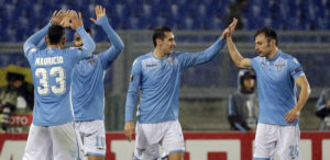 Lazio's Miroslav Klose, center, celebrates with teammates after scoring during the second leg of the UEFA Europa League round of 32 soccer match between Lazio and Galatasaray, at Rome's Olympic stadium, Thursday, Feb. 25, 2016. (AP Photo/Gregorio Borgia)