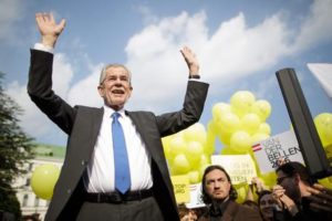 epaselect epa05319582 Presidential candidate and former head of the Austrian Green Party Alexander Van der Bellen waves after his speech during his final election rally in Vienna, Austria, 20 May 2016. Van der Bellen secured 21 percent of total votes in the first round and will go head to head in the run-offs against right wing Freedom Party (FPOe) candidate Norbert Hofer on 22 May 2016. EPA/LISI NIESNER