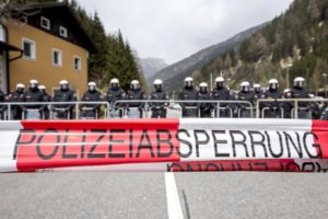 Riot Austrian police line up to face protesters (not pictured) during a rally against the Austrian government's planned re-introduction of border controls at the Brenner Pass, Austria, 24 April 2016. ANSA/JAN HETFLEISCH