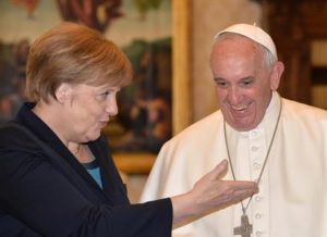 German Chancellor Angela Merkel (L) with Pope Francis during a private audience on May 6, 2016 at the Vatican. Merkel is in Rome to take part in a ceremony for the awarding of Germany's famed Charlemagne Prize to Pope Francis, given to public figures in recognition of contribution to European unity. ANSA/ ALBERTO PIZZOLI/AFP/POOL