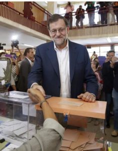 Acting Spanish Prime Minister, Mariano Rajoy, greets an electoral member upon his arrival to vote in the general elections at a polling station Madrid, Spain, 26 June 2016. EPA/ANGEL DIAZ