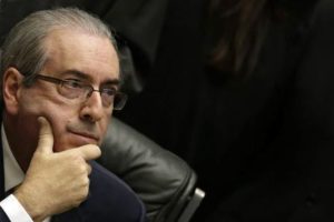 epa05260691 Eduardo Cunha, President of Brazilian Chamber of Deputies, attends a session of the Chamber of Deputies in Brasilia, Brazil, 15 April 2016. The lower house is scheduled to vote 17 April on the impeachment resolution. Brazil's Supreme Court dealt President Dilma Rousseff a major setback in her bid to remain in power by ruling early 15 April that an impeachment vote can take place this weekend in the lower house of Congress, where her opponents appear to have assembled the two-thirds majority needed to send the proceedings to the Senate. EPA/FERNANDO BIZERRA JR