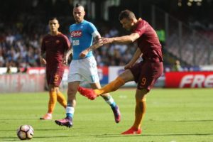 AS Roma forward Edin Dzeko scores the 1-0 goal lead against SSC Napoli during Italian Serie A soccer match between SSC Napoli and AS Roma at San Paolo stadium in Naples, 15 October 2016. ANSA / CESARE ABBATE