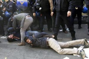 Police officers detain people after dispersing supporters of pro-Kurdish Peoples' Democratic Party, HDP, protesting against the detentions of Kurdish lawmakers, in Ankara, Turkey, Friday, Nov. 4, 2016. Authorities in Turkey detained 11 pro-Kurdish lawmakers early Friday as part of ongoing terror-related investigations, including both party co-chairs Selahattin Demirtas and Figen Yuksekdag and other senior officials, the Interior Ministry said. (ANSA/AP Photo)