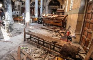 epa05670929 People inspect the damage inside the St. Peter and St. Paul Coptic Orthodox Church following a bombing in Cairo, Egypt, 11 December 2016. Reports state at least 25 people were killed and 35 injured on 11 December 2016 in an explosion outside Cairo's Coptic Cathedral in the Abbassia neighborhood. Local media quoting security and Church officials said the explosion occurred in the St. Peter and St. Paul Coptic Orthodox Church, a small chapel attached to the Coptic Cathedral. EPA/MOHAMED HOSSAM