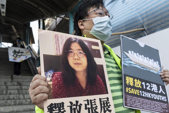 Families of arrested people gather at Liaison Office as trial starts in Shenzhen